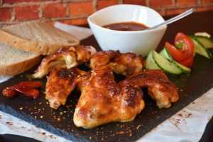 Home Professionele BBQ cateraar in Utrecht bereidt heerlijk vlees voor groot gezelschap